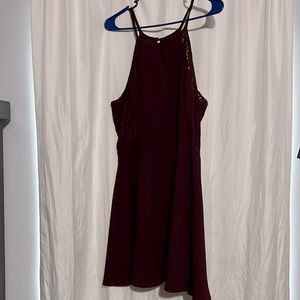 Speechless maroon homecoming dress with lace sides and slit in front!